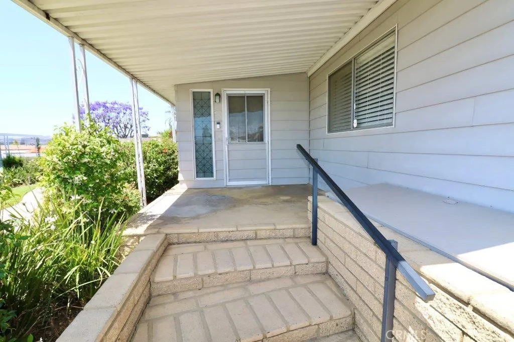 16901 Pleasant Way, Unit 231 Yorba Linda, CA 92886 - Photo 15 of 43 a view of entryway with flower pots
