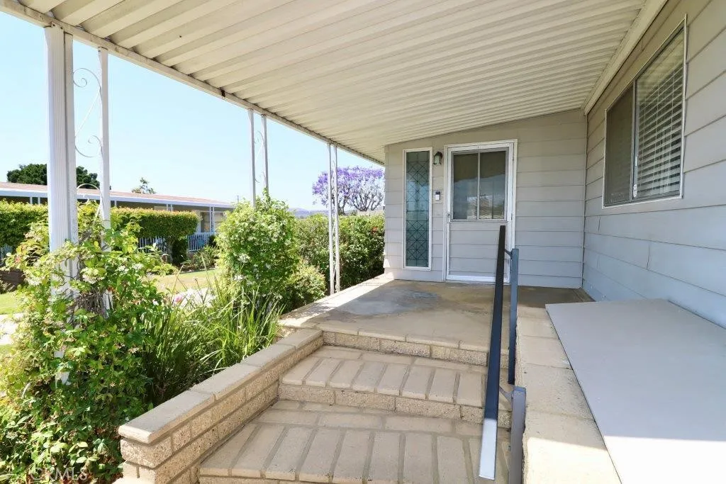 16901 Pleasant Way, Unit 231 Yorba Linda, CA 92886 - Photo 16 of 43 a front view of a house with garden