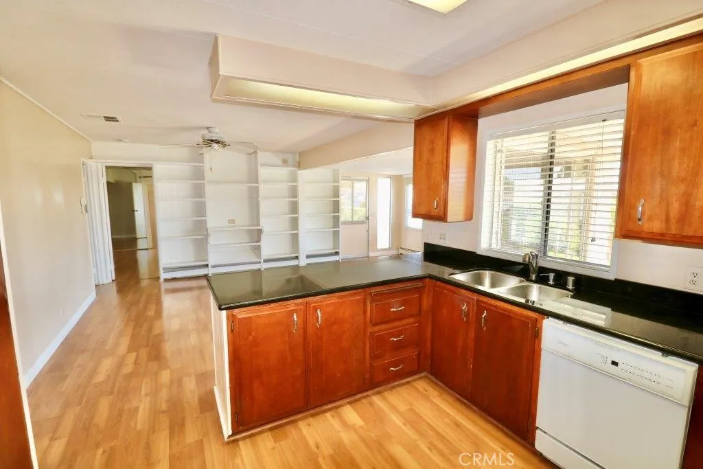 16901 Pleasant Way, Unit 231 Yorba Linda, CA 92886 - Photo 23 of 43 a view of a kitchen with a large window