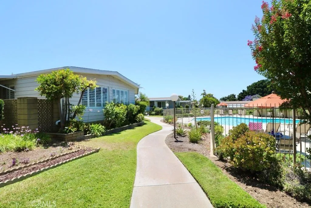 16901 Pleasant Way, Unit 231 Yorba Linda, CA 92886 - Photo 3 of 43 a view of a garden with a lake view