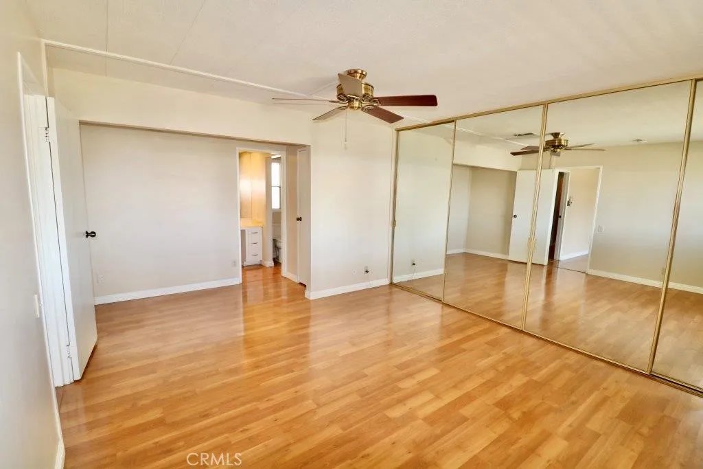 16901 Pleasant Way, Unit 231 Yorba Linda, CA 92886 - Photo 32 of 43 a view of empty room with wooden floor