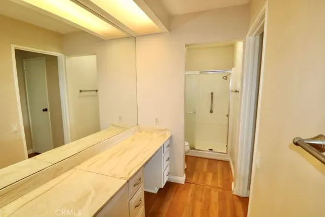 a bathroom with a sink and a shower