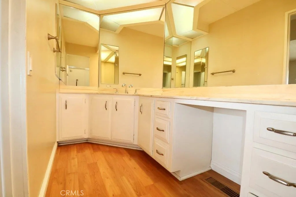 16901 Pleasant Way, Unit 231 Yorba Linda, CA 92886 - Photo 37 of 43 a bathroom with a sink and a mirror