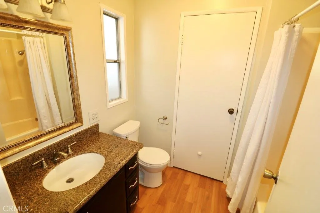 16901 Pleasant Way, Unit 231 Yorba Linda, CA 92886 - Photo 42 of 43 a bathroom with a sink toilet and shower