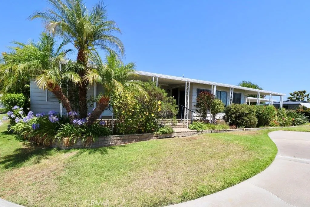 16901 Pleasant Way, Unit 231 Yorba Linda, CA 92886 - Photo 6 of 43 a view of a house with a yard patio and swimming pool