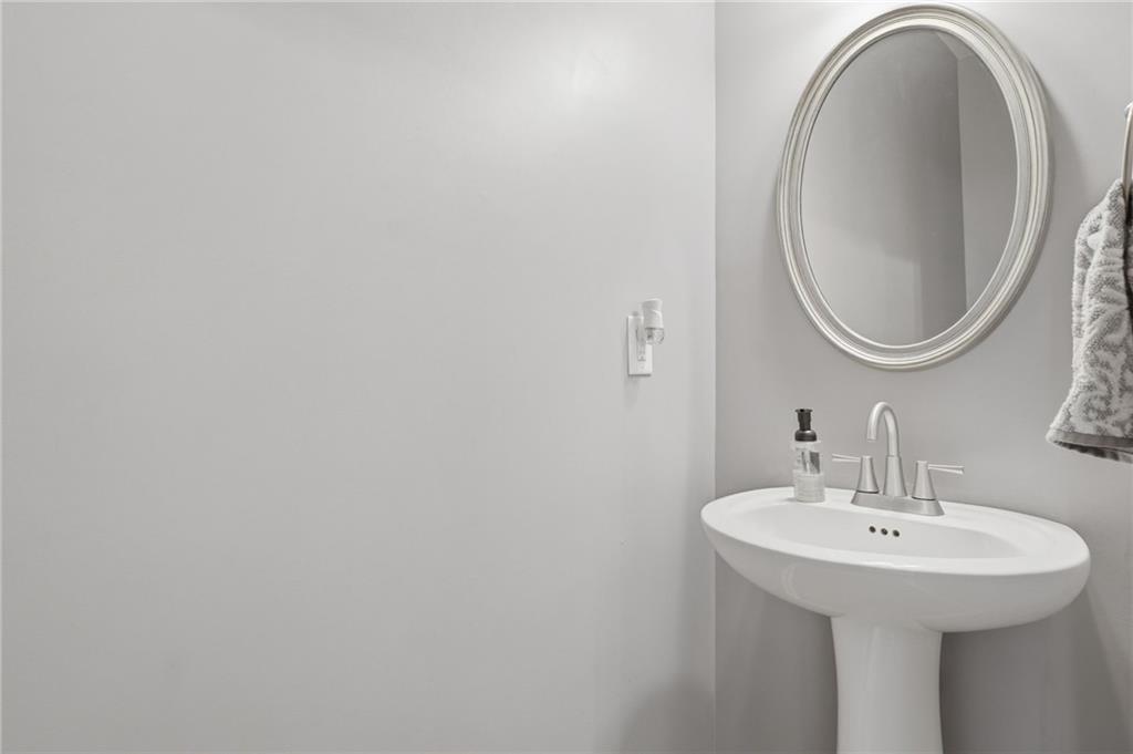 123 Renford Road Ball Ground, GA 30107 - Photo 9 of 27 a bathroom with a sink and a mirror