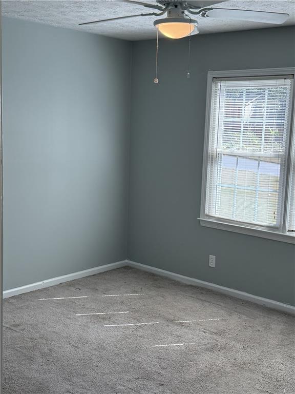 975 Ridgedale Drive Lawrenceville, GA 30043 - Photo 13 of 31 an empty room with a window