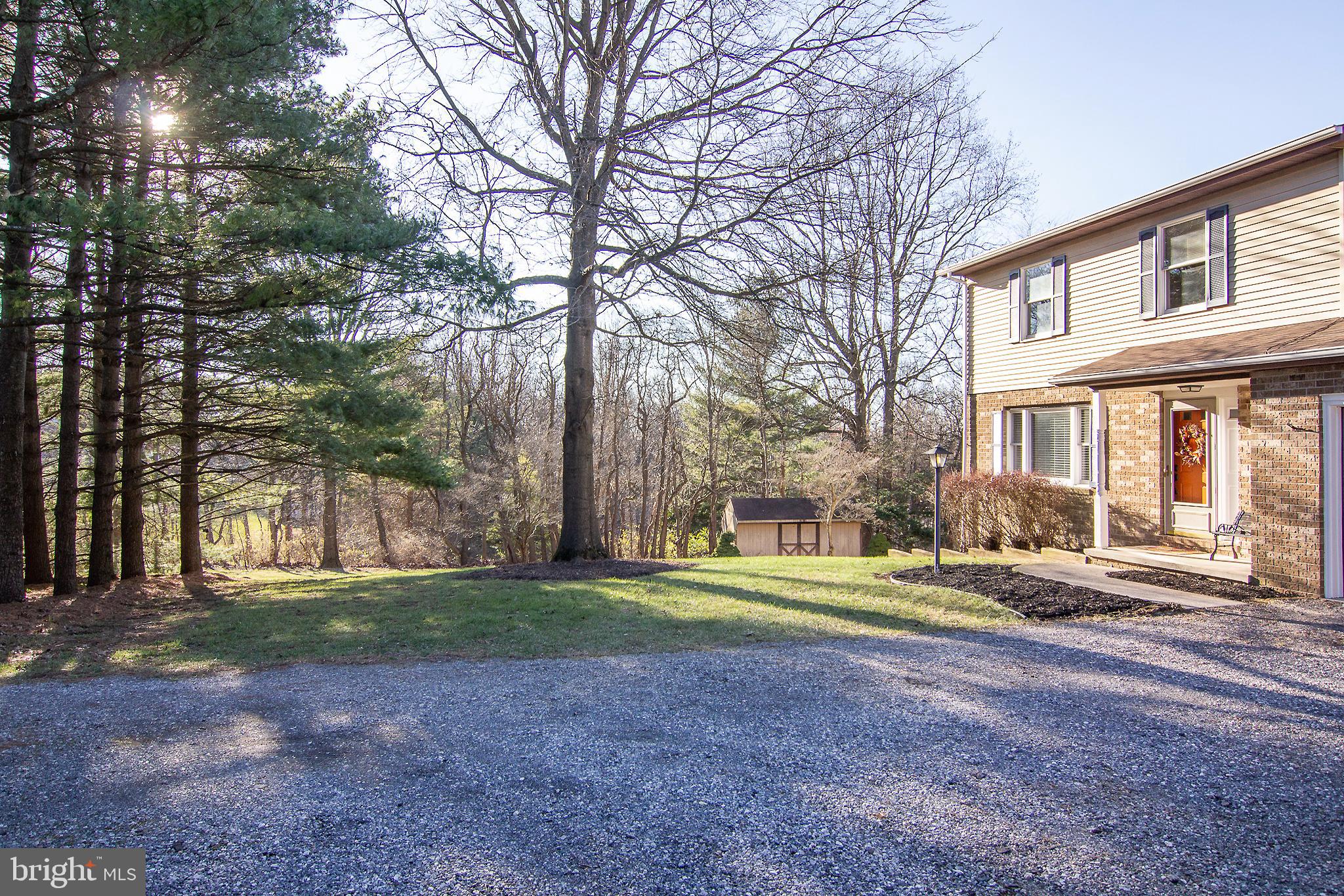 2630 Bert Fowler Road Manchester, MD 21102 - Photo 36 of 39 Front yard with mature pine tree border