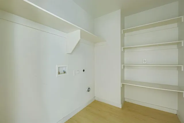 a view of an empty walk in closet