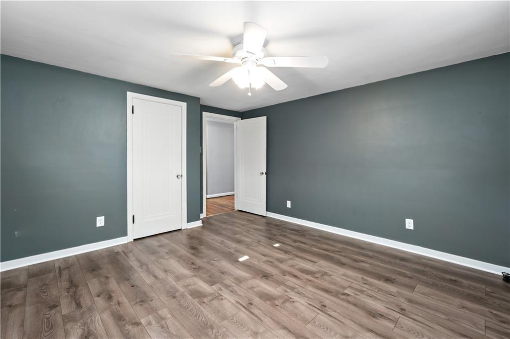 425 MacArthur Street McKees Rocks, PA 15136 - Photo 13 of 25 an empty room and chandelier fan
