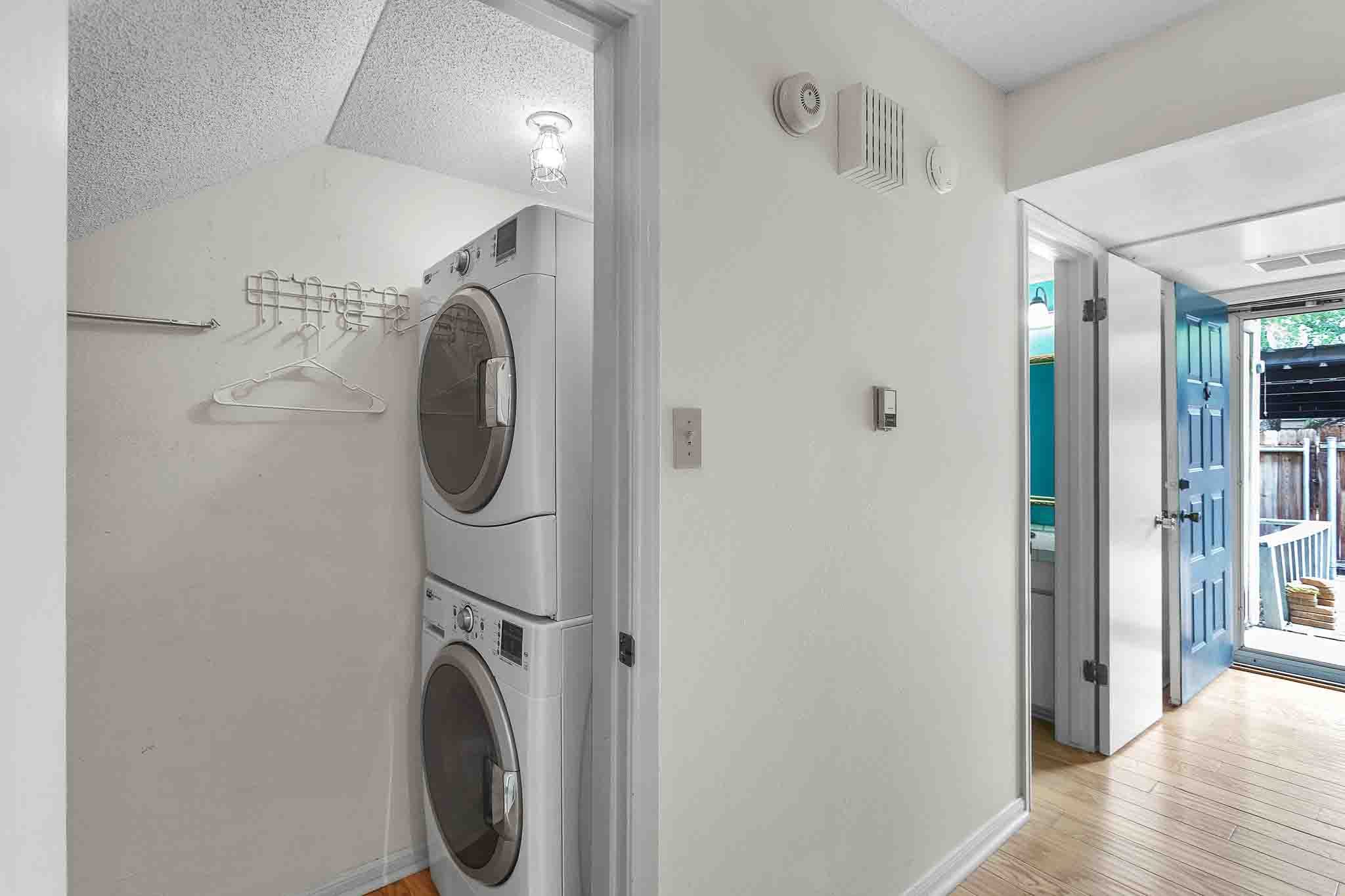 9226 Jollyville Road, Unit 132 Austin, TX 78759 - Photo 9 of 15 A dedicated laundry closet offers a convenient stacked washer and dryer.