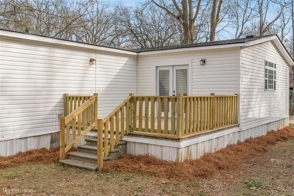 a view of a back yard of the house