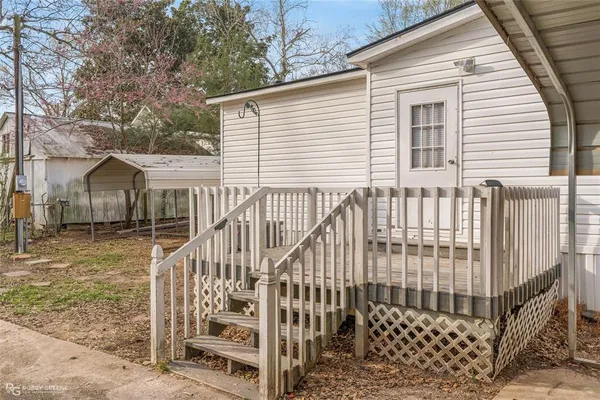a view of a house with a deck