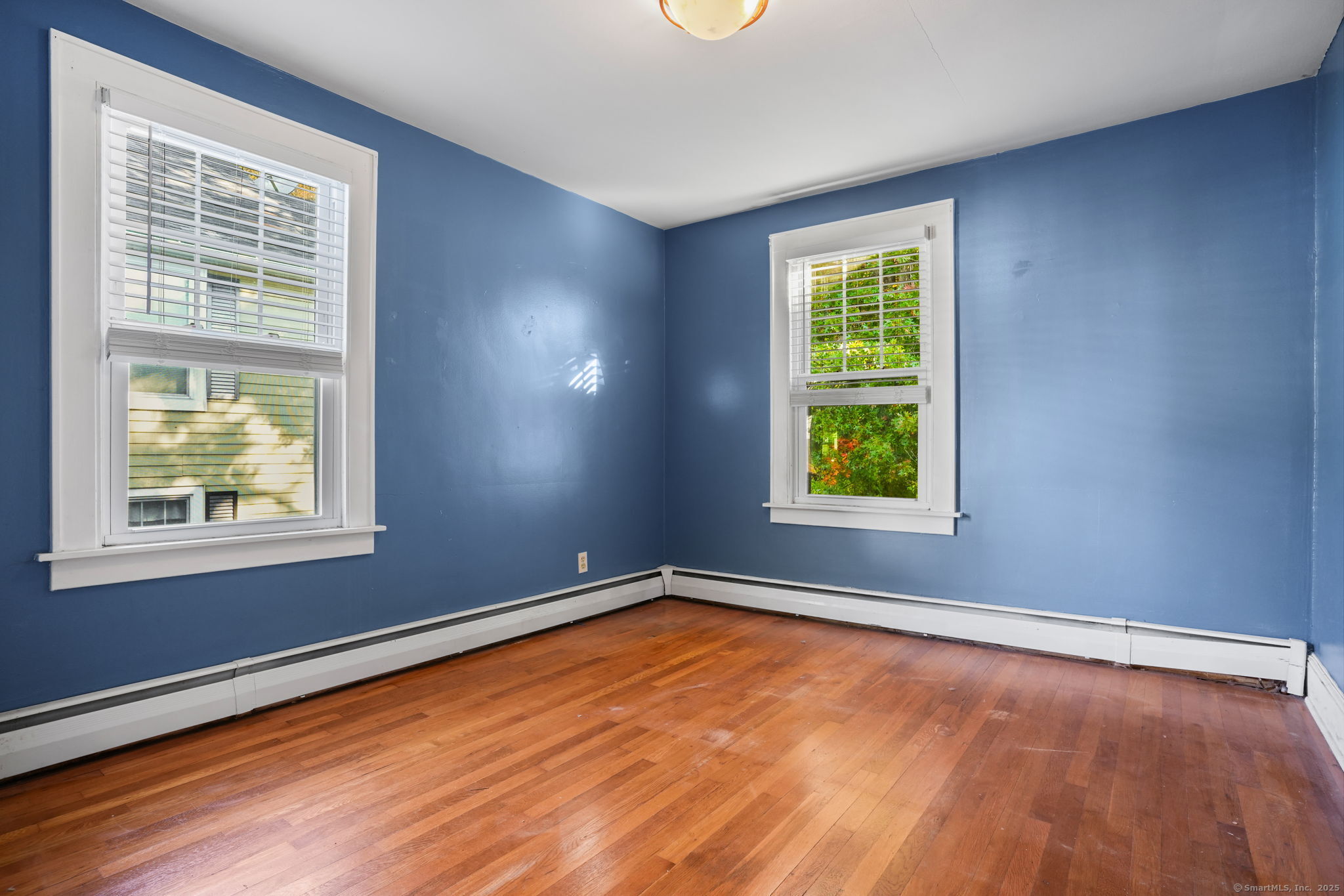 117 Golden Hill Street Naugatuck, CT 06770 - Photo 6 of 10 an empty room with a window