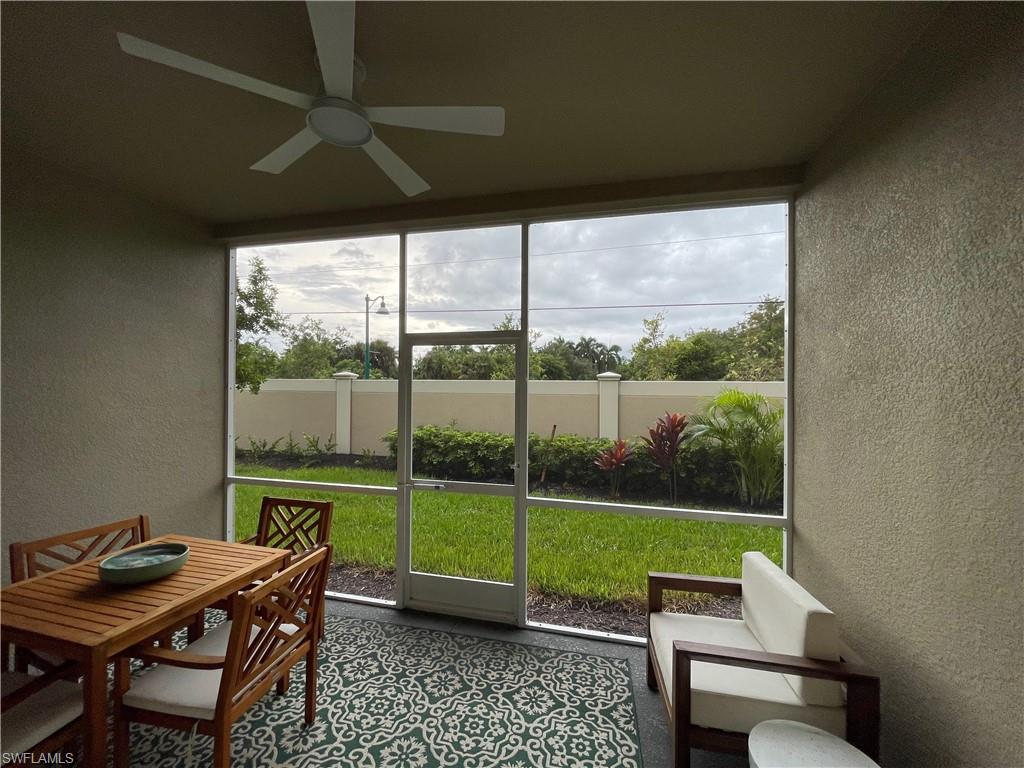 4676 Arboretum Circle, Unit 101 Naples, FL 34112 - Photo 17 of 24 a garden view with a sitting space