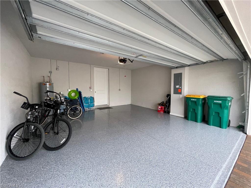 4676 Arboretum Circle, Unit 101 Naples, FL 34112 - Photo 22 of 24 a view of a bike garage