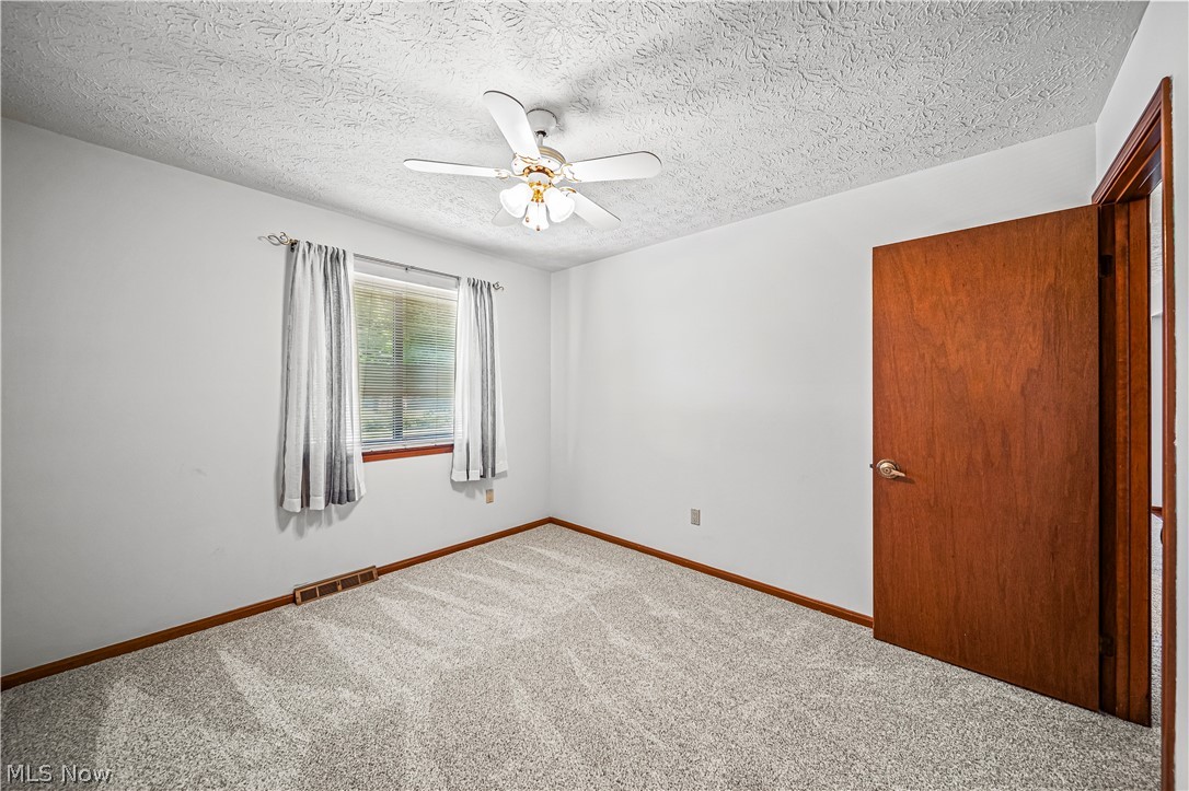 3010 Narrows Road Perry, OH 44081 - Photo 15 of 42 Bedroom #2 on main level featuring brand new carpet.