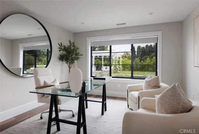 a view of a livingroom with furniture window and outside view