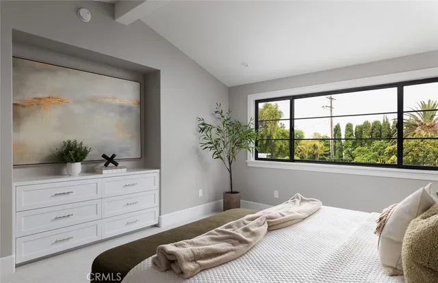 a bathroom with a tub a sink and mirror