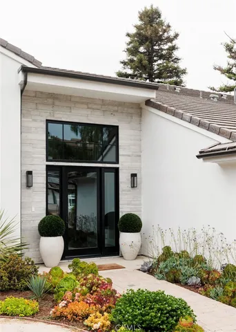 a bathroom with a toilet a sink and a shower