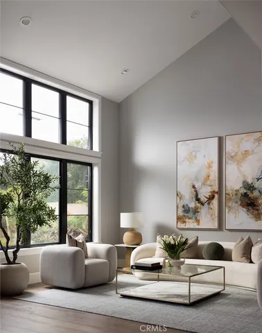 a living room with furniture and large window