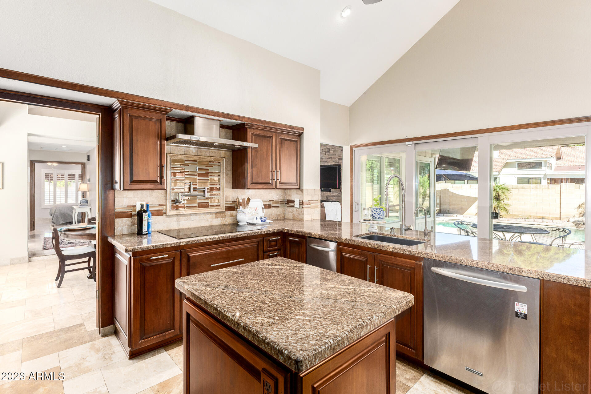 1942 East Krista Way Tempe, AZ 85284 - Photo 11 of 51 a kitchen with stainless steel appliances granite countertop stove top oven and cabinets