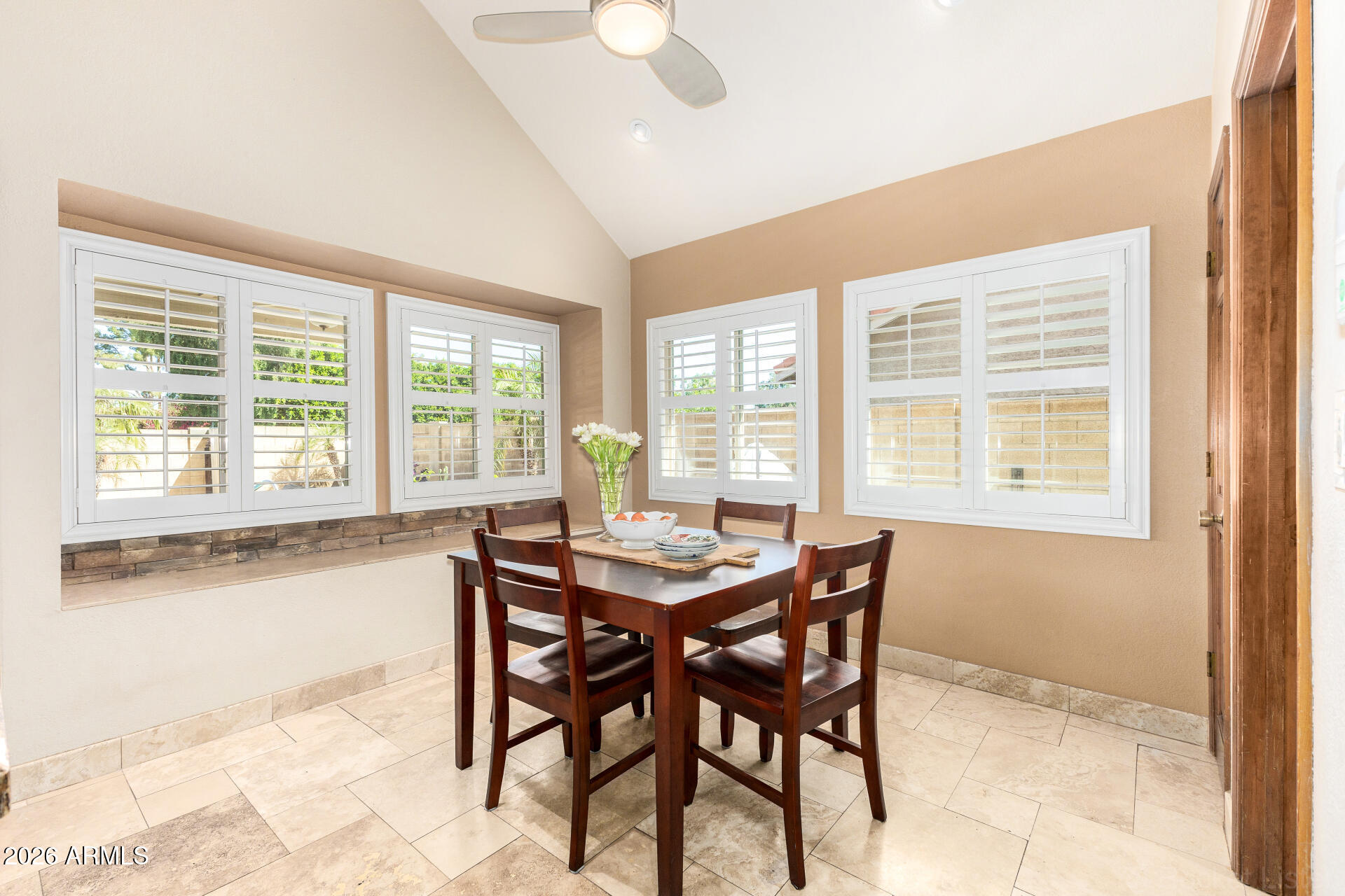 1942 East Krista Way Tempe, AZ 85284 - Photo 12 of 51 a dining room with furniture and windows