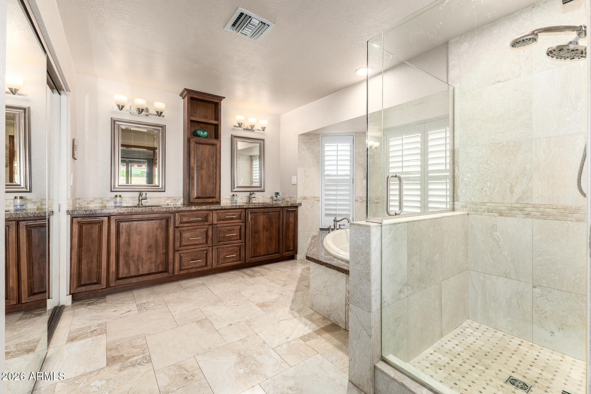 1942 East Krista Way Tempe, AZ 85284 - Photo 24 of 51 a bathroom with a tub a sink a mirror and a shower