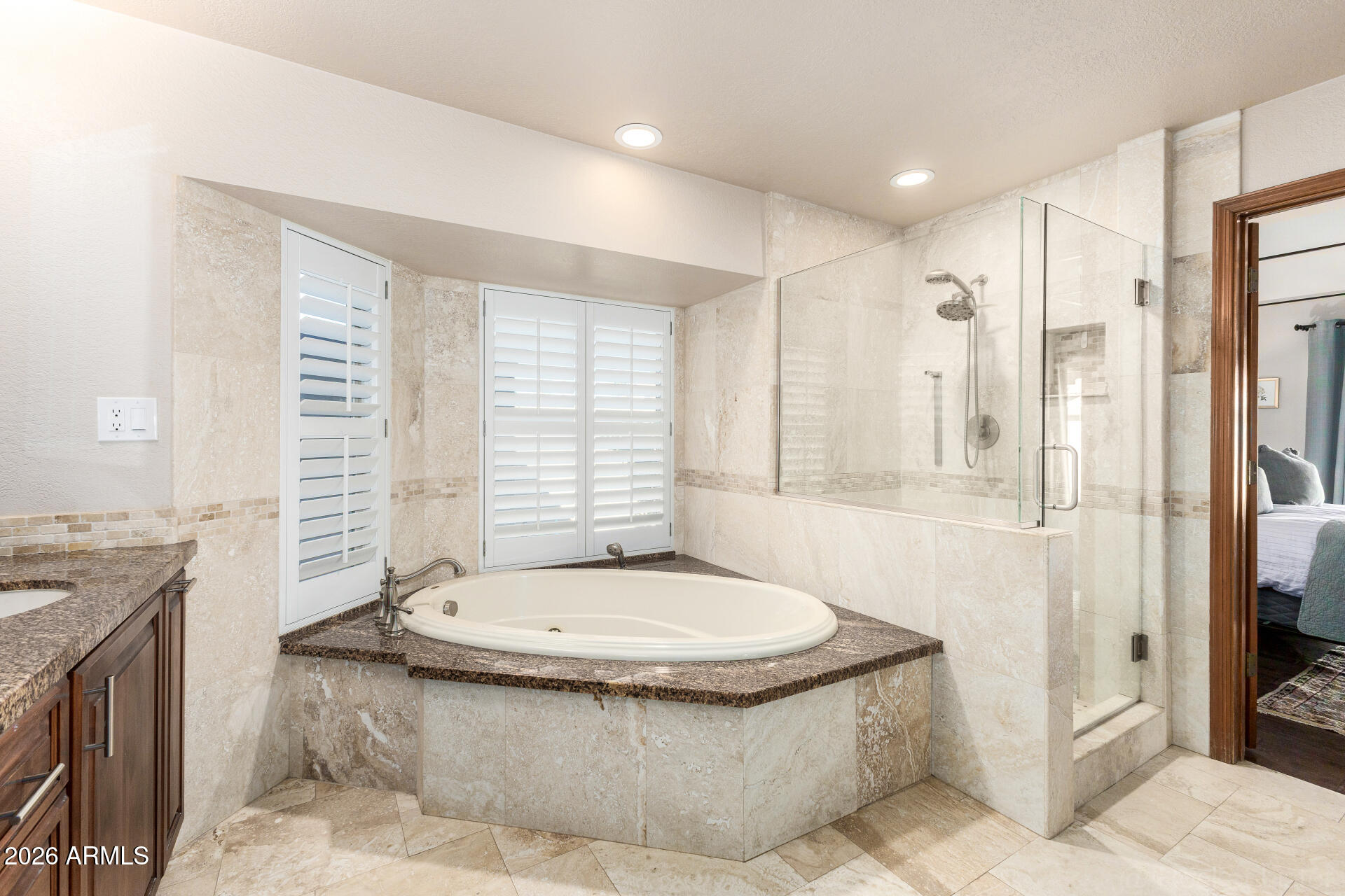 1942 East Krista Way Tempe, AZ 85284 - Photo 26 of 51 a bathroom with a tub a sink and a window