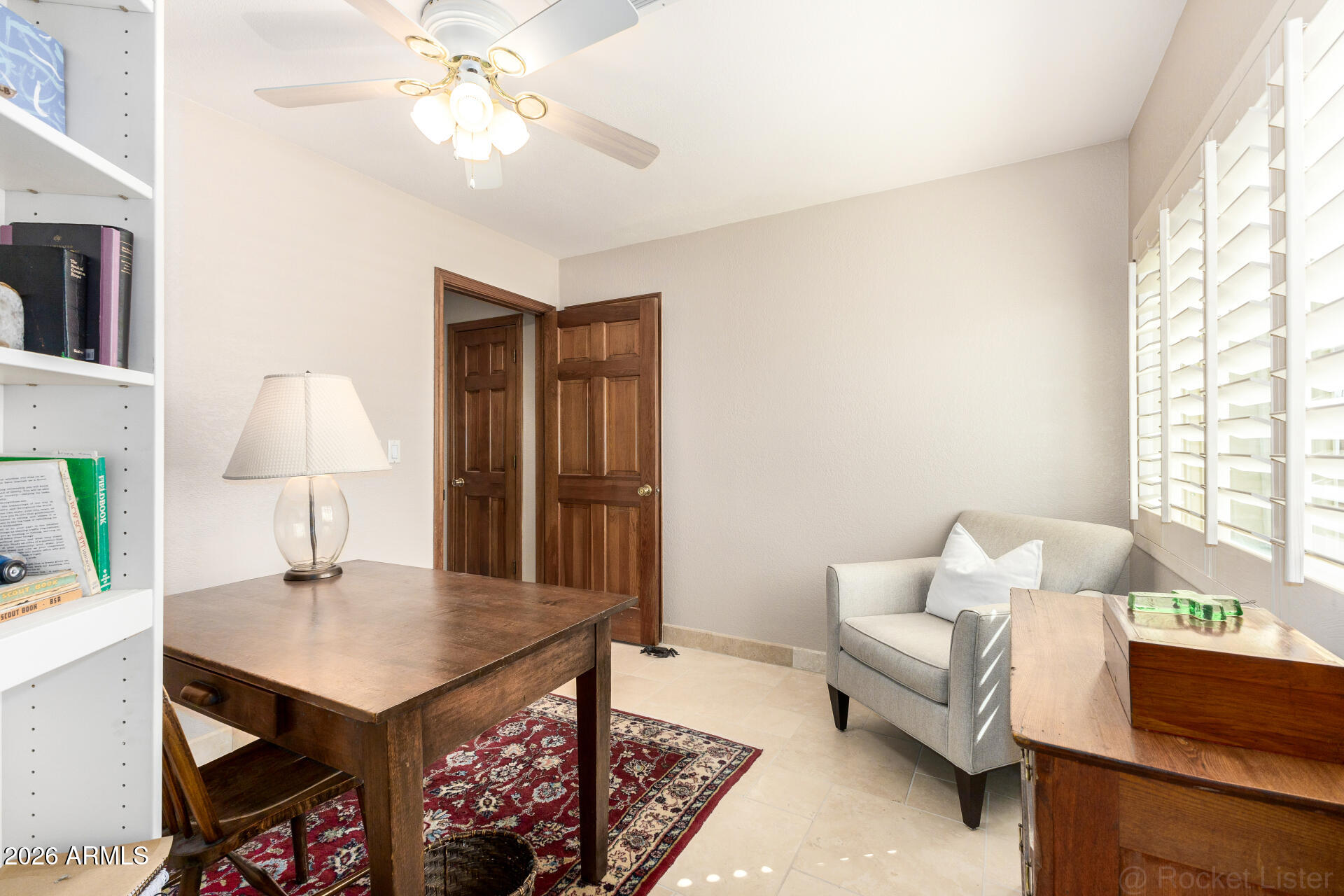 1942 East Krista Way Tempe, AZ 85284 - Photo 33 of 51 a living room with furniture and a table