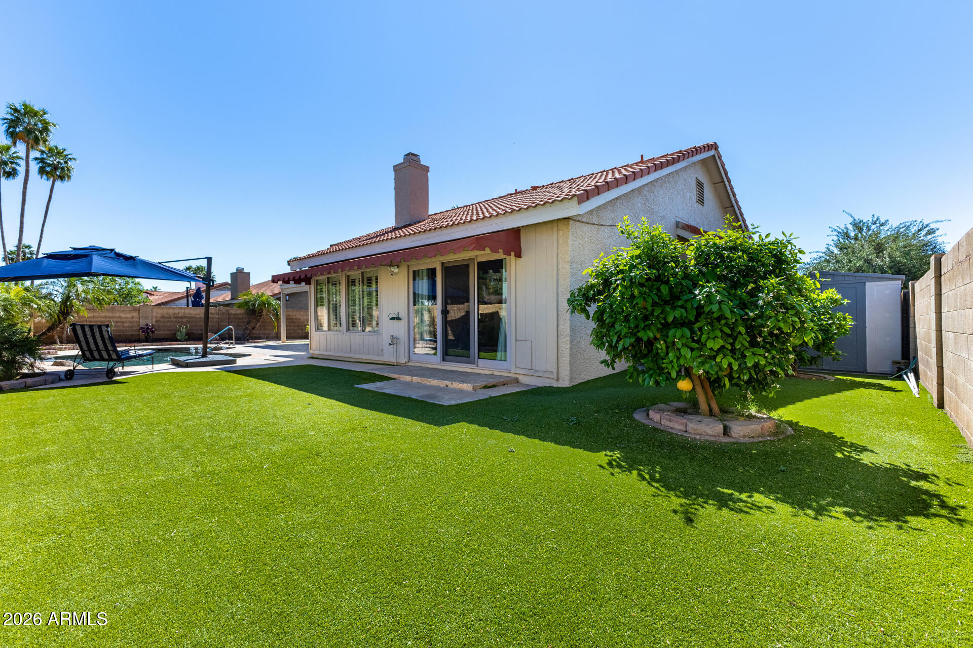 1942 East Krista Way Tempe, AZ 85284 - Photo 39 of 51 a front view of a house with garden