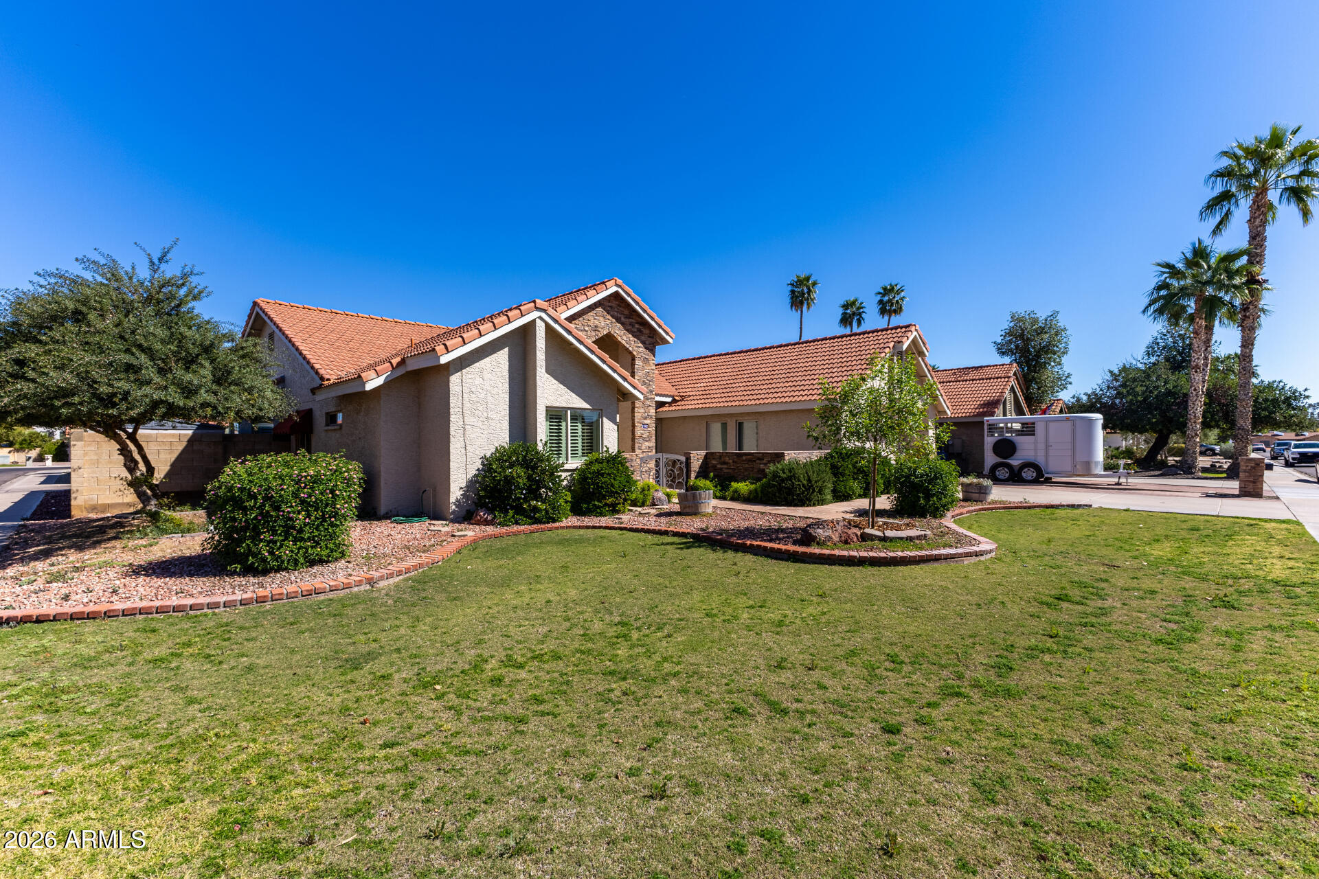 1942 East Krista Way Tempe, AZ 85284 - Photo 45 of 51 a view of a house with swimming pool and a yard
