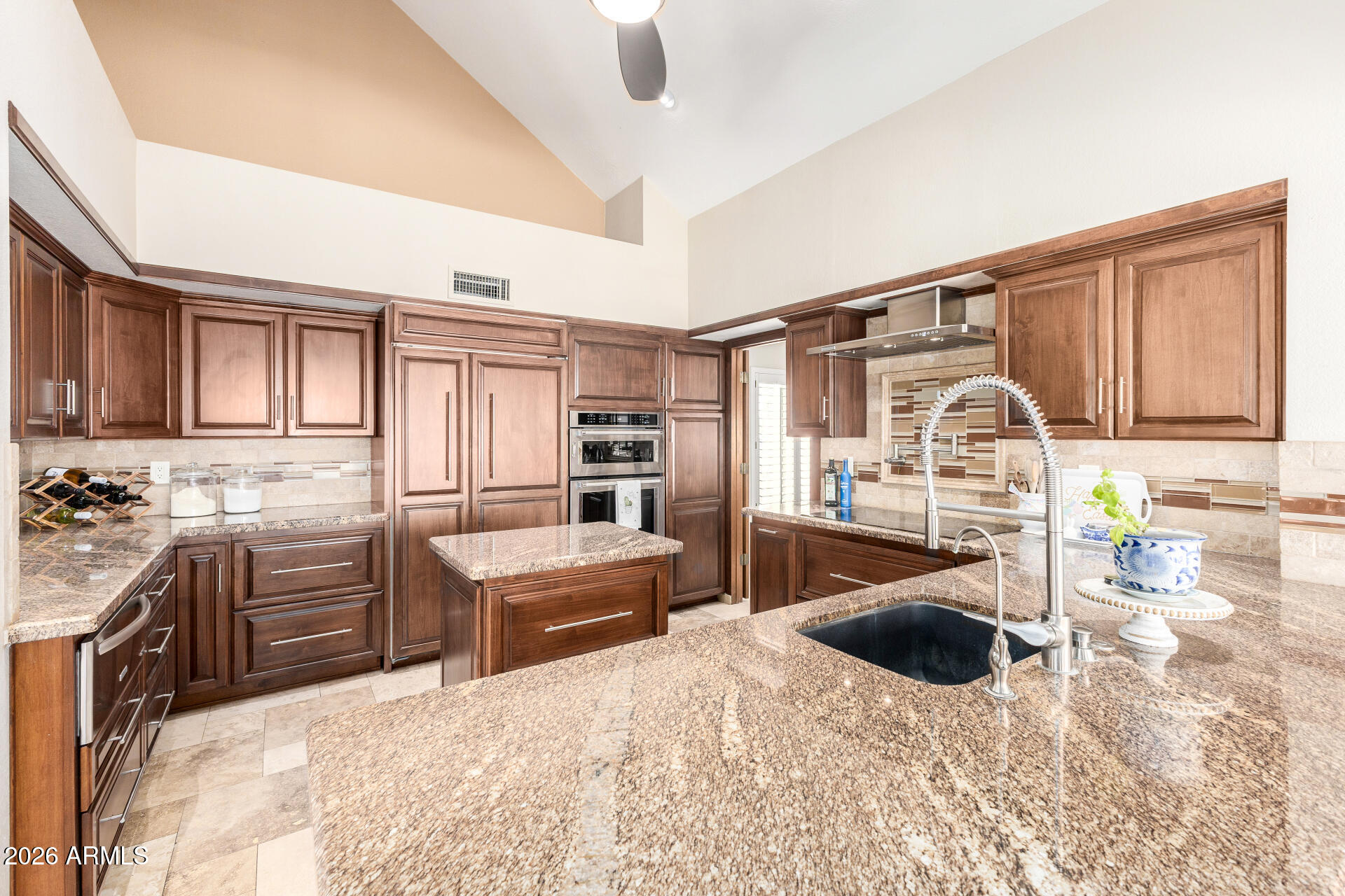 1942 East Krista Way Tempe, AZ 85284 - Photo 8 of 51 a kitchen with stainless steel appliances a stove a sink and a refrigerator
