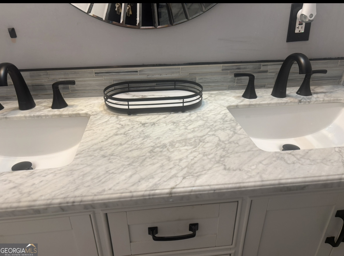 4276 Cedar Valley Court Conley, GA 30288 - Photo 12 of 13 a close view of sink and tap