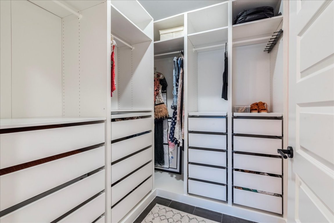 3101 Govalle Avenue, Unit 220 Austin, TX 78702 - Photo 13 of 26 a view of walk in closet with empty racks