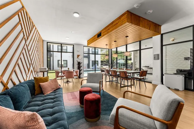 a view of a balcony with chairs