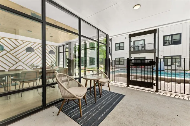 a view of a house with a backyard and a window