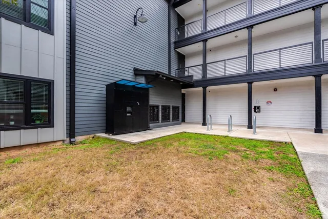 a view of a building with a street
