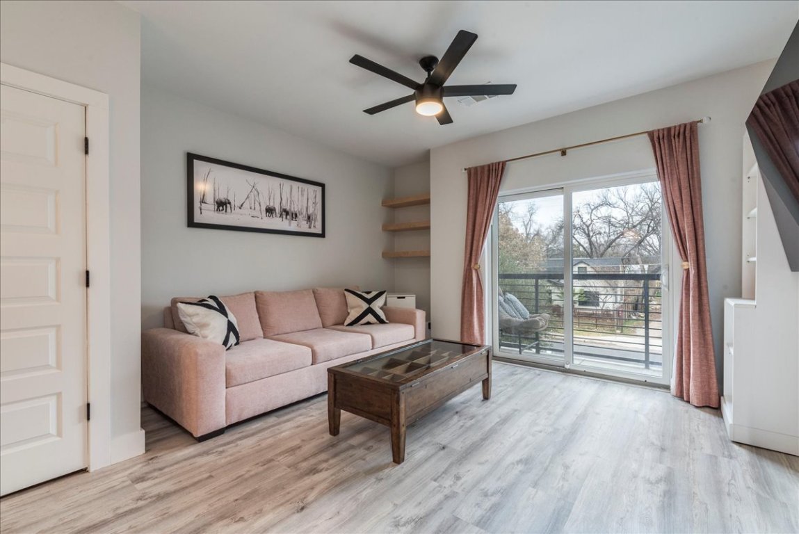 3101 Govalle Avenue, Unit 220 Austin, TX 78702 - Photo 5 of 26 a living room with furniture and a large window