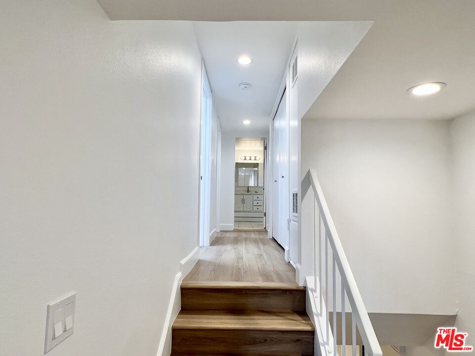 13218 Fiji Way, Unit B Marina del Rey, CA 90292 - Photo 38 of 63 a view of entryway and hall with wooden floor