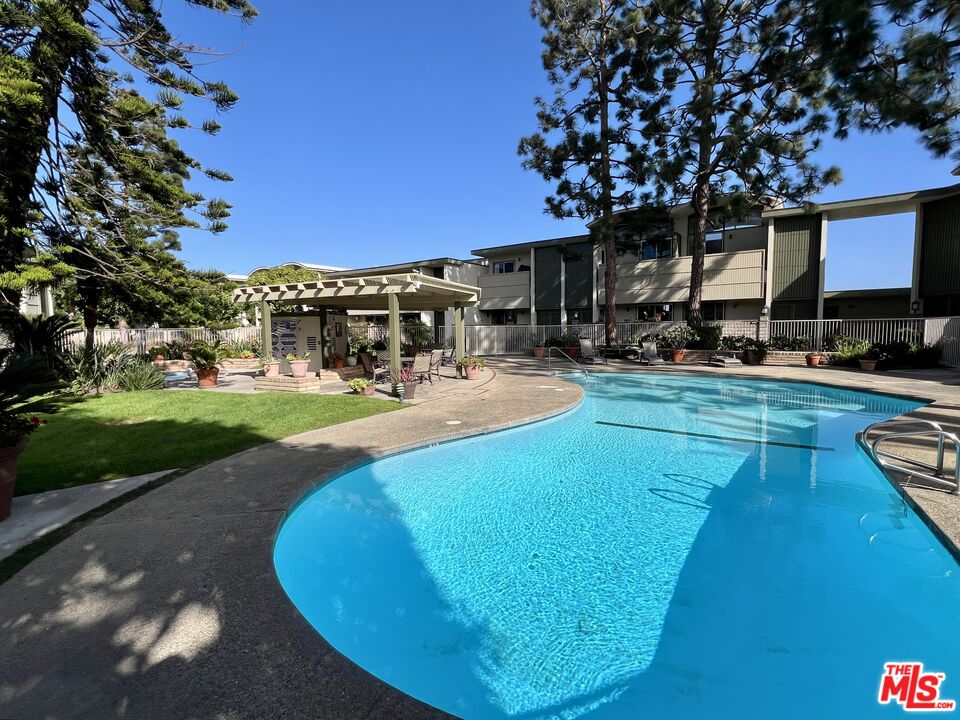 13218 Fiji Way, Unit B Marina del Rey, CA 90292 - Photo 62 of 63 a view of a swimming pool with a patio