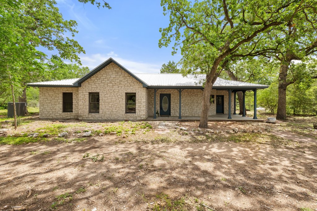 244 Woodway Elgin, TX 78621 - Photo 5 of 40 a front view of a house with a garden