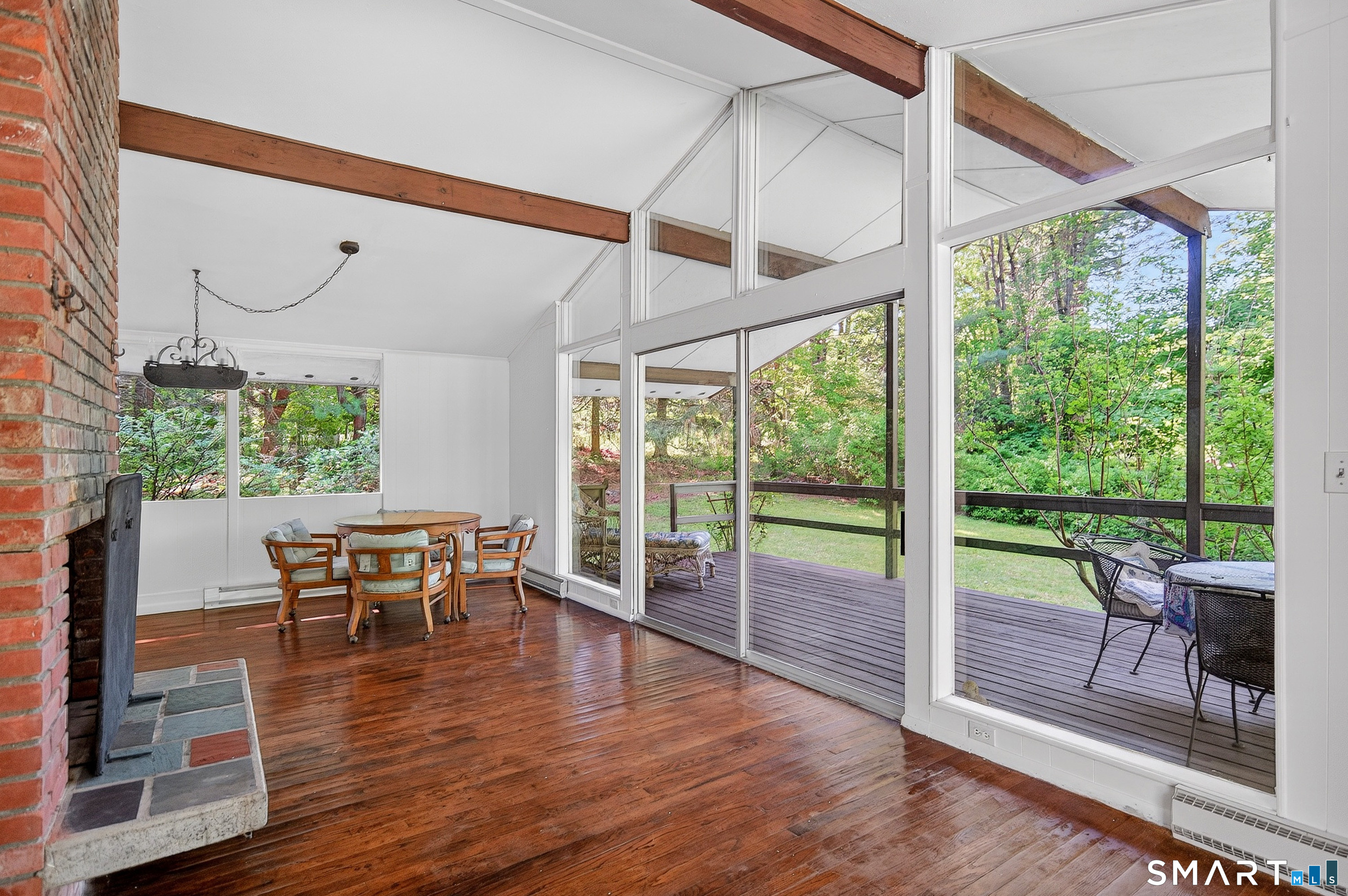 4 Pepper Pond Road Sherman, CT 06784 - Photo 8 of 33 a dining room with wooden floor table and chairs