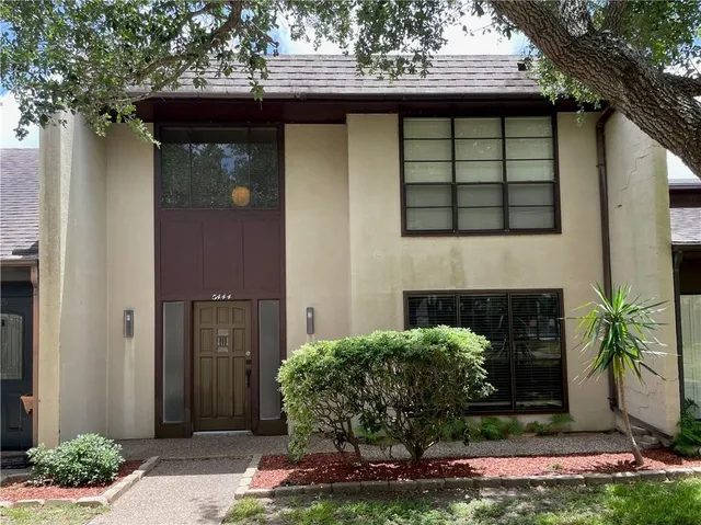 a front view of a house with porch