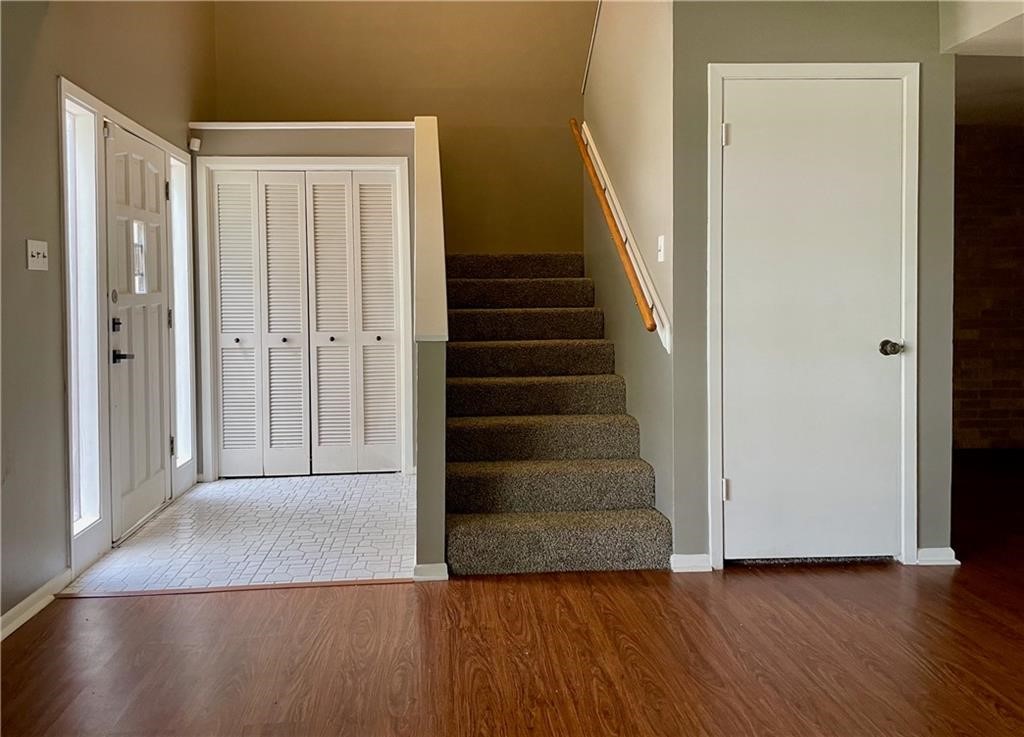 5444 Stonegate Way Corpus Christi, TX 78411 - Photo 5 of 13 a view of an entryway with wooden floor