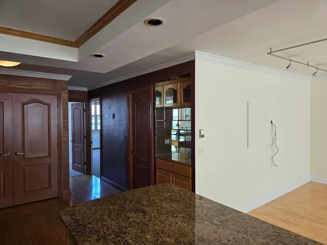 a view of an empty room and window