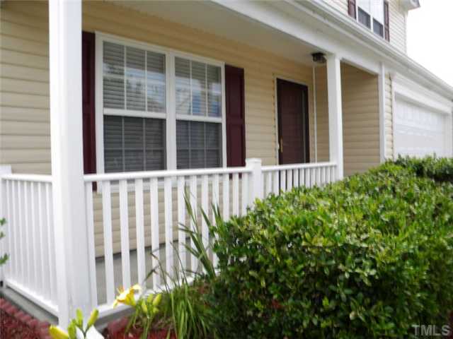 4613 Marathon Lane Raleigh, NC 27616 - Photo 2 of 24 Great the neighbors on the cozy rocking chair front porch,