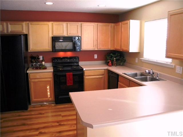 4613 Marathon Lane Raleigh, NC 27616 - Photo 7 of 24 Kitchen includes built in microwave and lots of counter