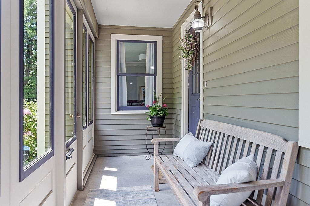 198 Still River Road Bolton, MA 01740 - Photo 2 of 36 a view of balcony with wooden floor