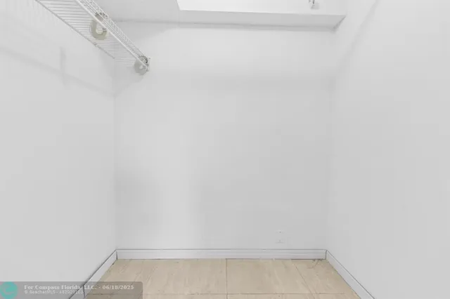 a view of small space with racks on the wall